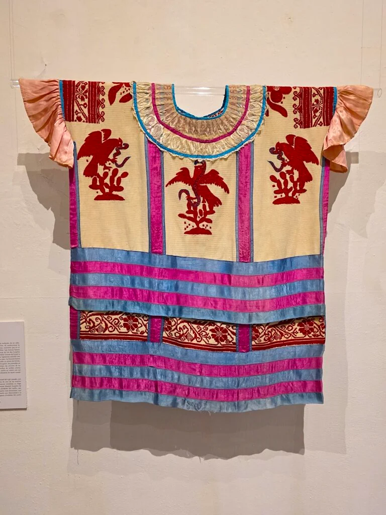 View fo a traditional blouse hanging inside the Textile Museum in Oaxaca. 