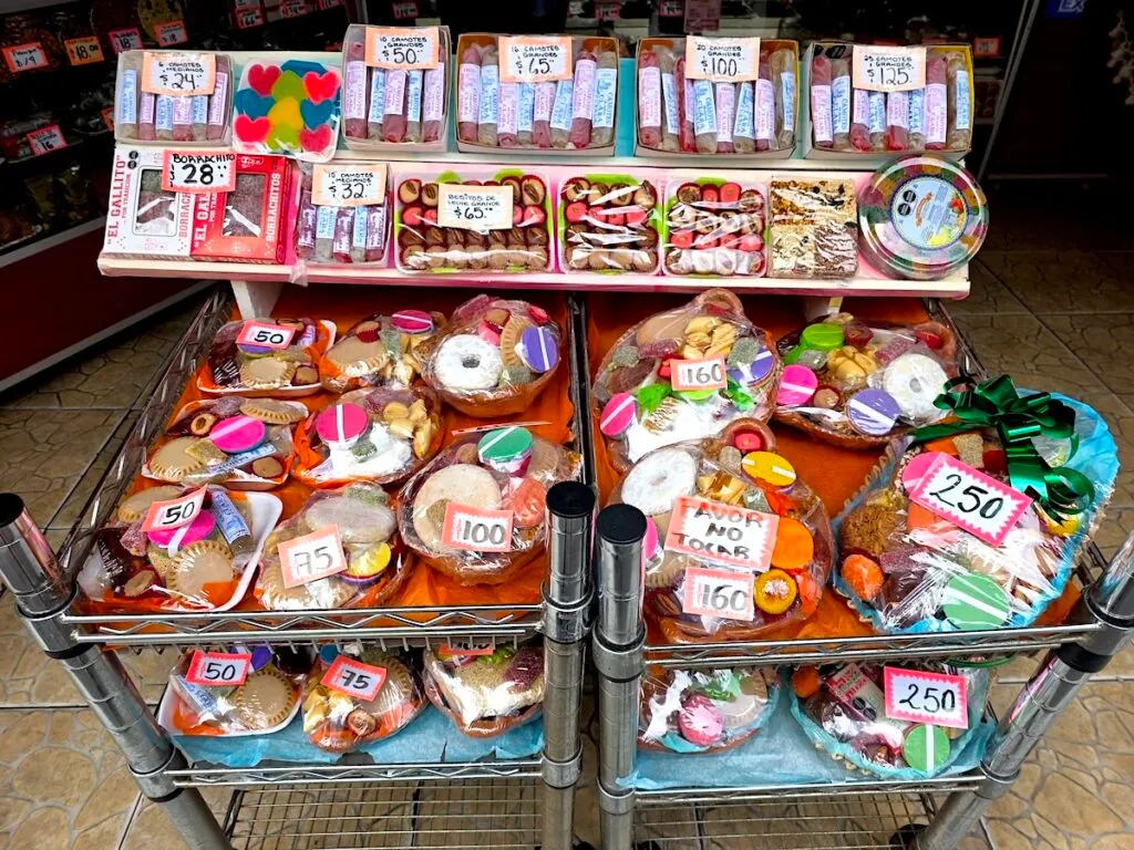 View of all the colorful sweets for sale on Calle de Los Dulces. 