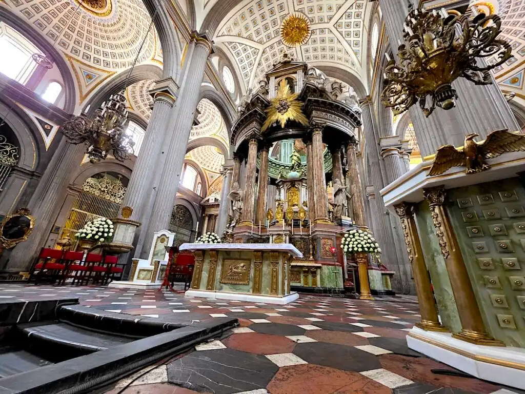 View of the ornate altar inside of Puebla Cathedral in Puebla. 