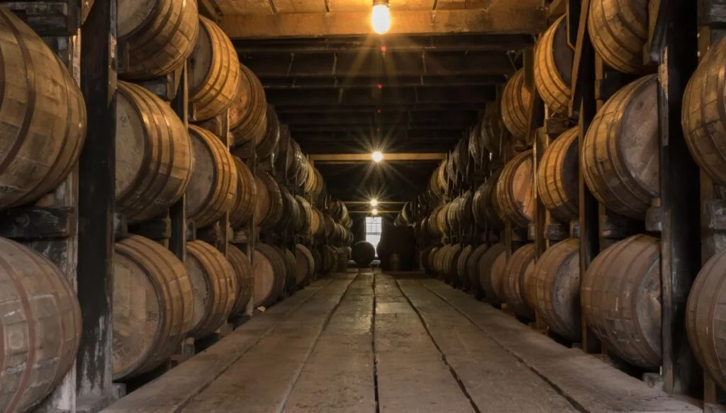 View of a warehouse with barrels of Bourbon that are being aged. 