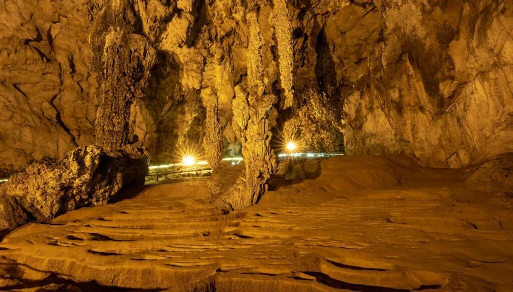 View of the unique rock formations that sit inside Crystal Lake Cave. 