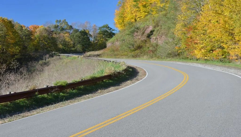 View of vibrant fall foliage that is yellow and that sits along the Highland Scenic Highway in West Virginia. This is one of the most beautiful places in West Virginia. 