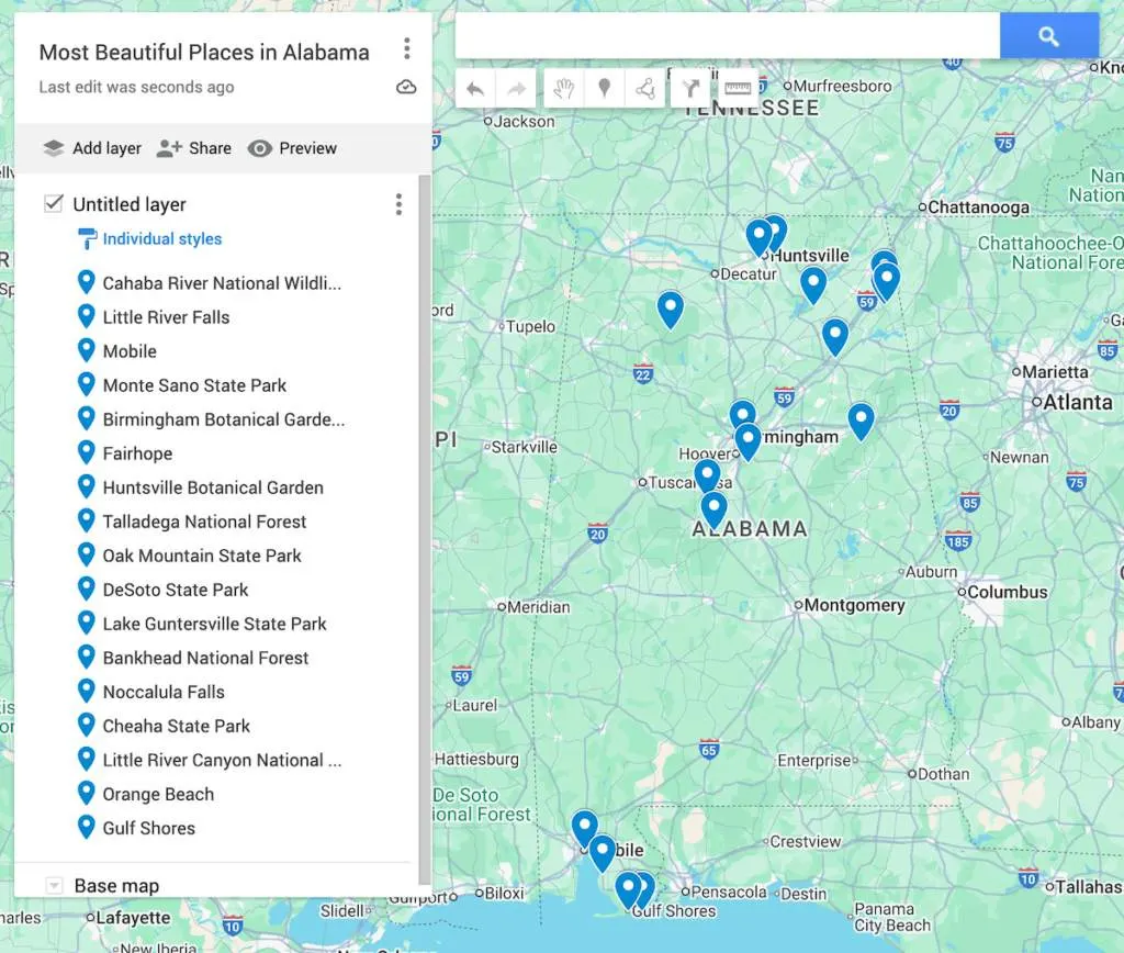 Map of Alabama with 17 blue dots to represent the most beautiful places in Alabama. 
