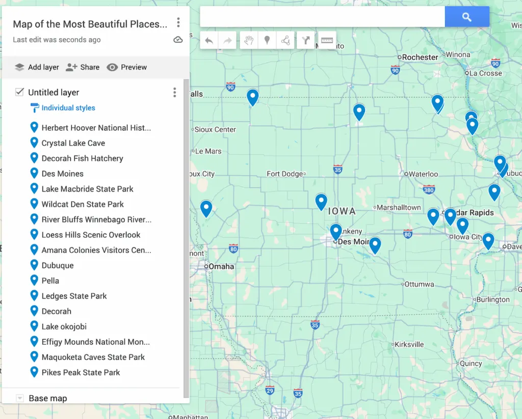 View of 17 blue dots on a map of Iowa that represent the most beautiful places in Iowa.