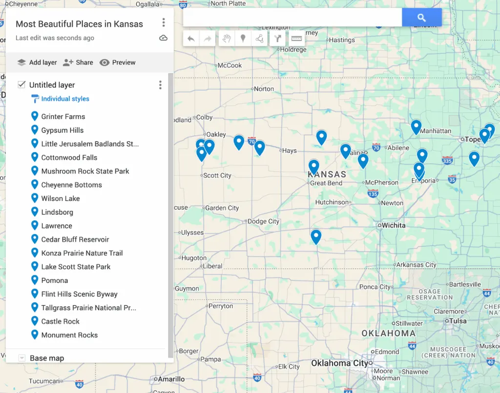View of 17 blue dots that represent the most beautiful places in Kansas on a map of Kansas. 