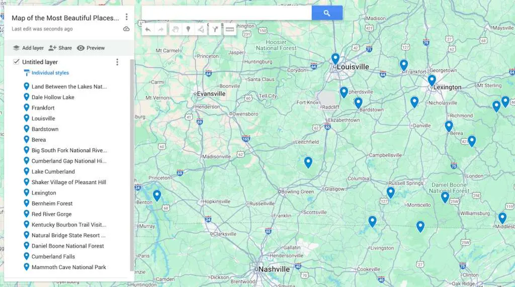 View of a map of Kentucky with 19 blue dots to represent the most beautiful places in Kentucky. 