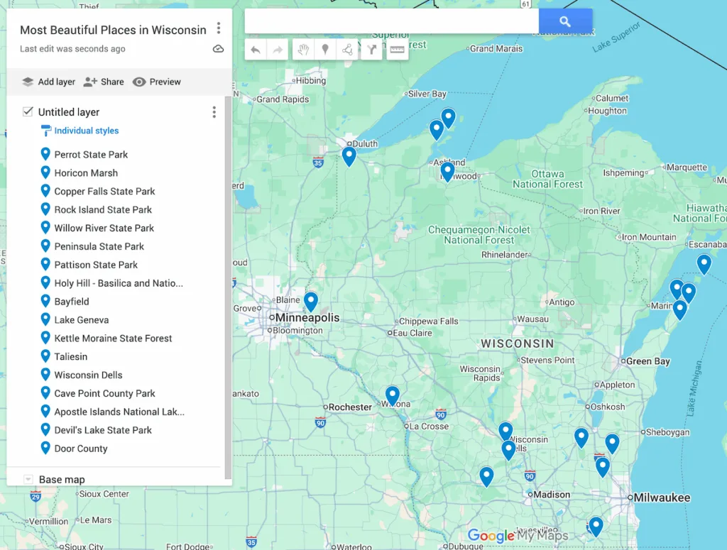 View of a map of Wisconsin with 17 blue dots to represent the most beautiful places in Wisconsin. 