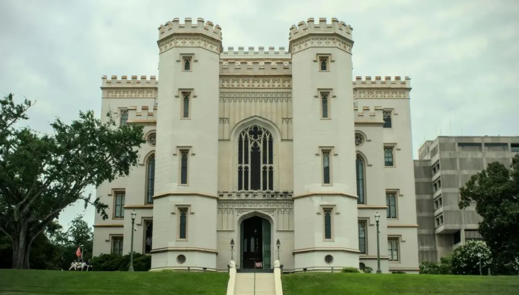 View of the Old State Capitol Building in Baton Rouge. You can see two white columns on either side of the doorway in this castle-like manson. 