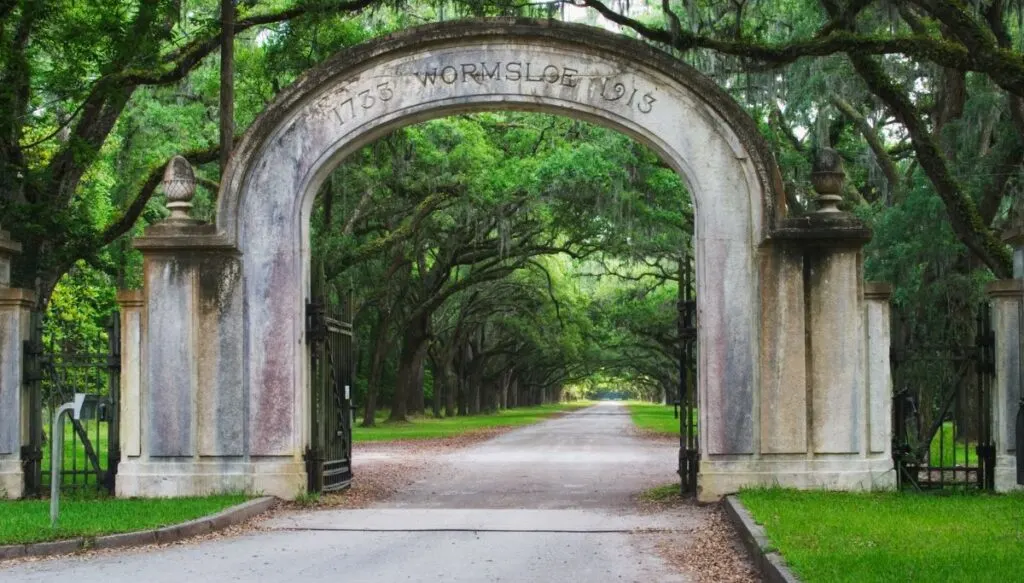 View of a stone gate that serves as the entrance to Wormsloe Historic Site in Georgia. 