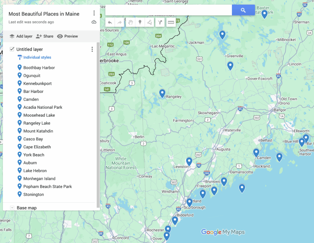View of a map of Maine with 17 blue dots to represent the most beautiful places in Maine.