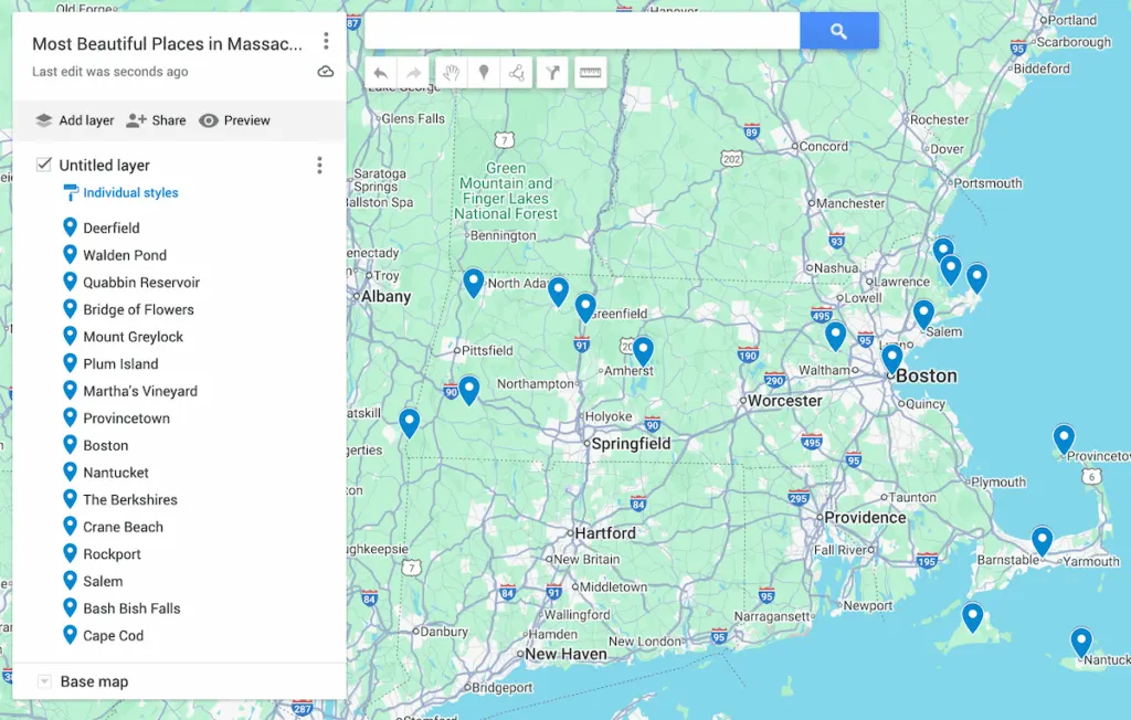View of a map of Massachusetts with 16 blue dots to represent the most beautiful places in Massachusetts. 