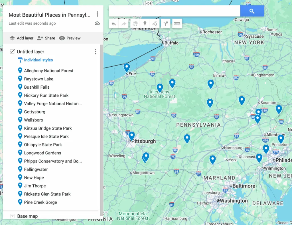 View of a mao of Pennsylvania with 17 blue dots to represent the most beautiful places in Pennsykvania. 