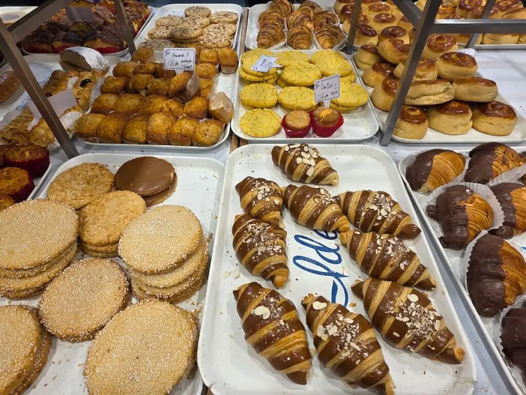 Aerial view of an assortment of pastries at Pasteleria Ideal on white trays. This is one of the best  restaurants in Mexico City. 