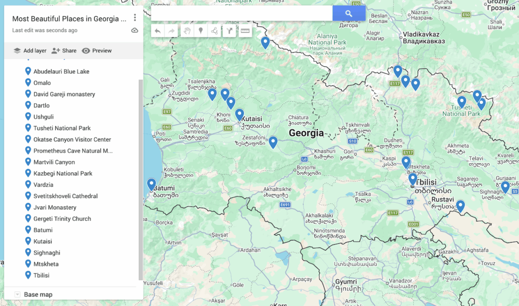 Map of Georgia with 19 blue dots to represent the most beautiful places in Georgia Europe. 