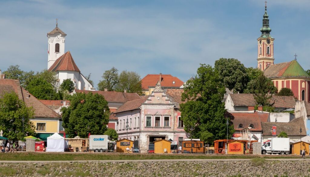View of little chalets and historic buildings along the river in Szentendre in Hungary.
